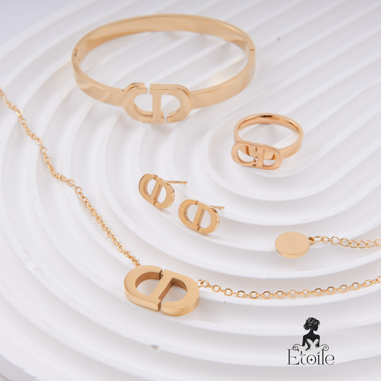 ✨ طقم CD كريستيان ديور – 4 قطع ذهبي فاخر ✨