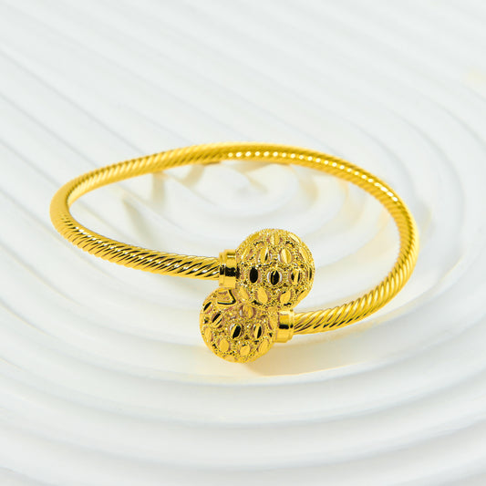 🌟 إسوارة بانجل "الطابة المجدولة" – أناقة البريق الملتوي 💫