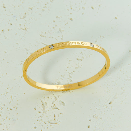 ✨ اسوارة تفاني Tiffany – ذهبي رفيع بزركون ✨