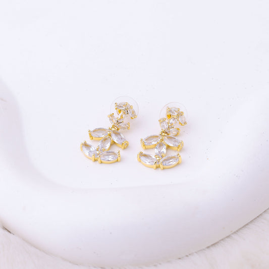 طقم شانيل – طبقتين بزركون ذهبي ✨💛