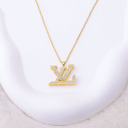 ✨ طقم لويس فيتون LV – فخم بزركون ذهبي ✨